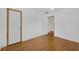 Bedroom with wood floors and large closet at 663 Romano Ave, Orlando, FL 32807