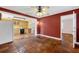 Kitchen with tile floor, updated appliances, cabinets, and natural light from the other room at 663 Romano Ave, Orlando, FL 32807