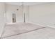 Spacious bedroom with plush carpeting, offering ample space and natural light at 6766 Edgeworth Dr, Orlando, FL 32819