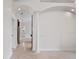 Hallway featuring tile floors, archways, columns and recessed lighting at 6766 Edgeworth Dr, Orlando, FL 32819