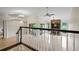 Bright living room with a fireplace, large windows, and access to the outdoor patio at 6766 Edgeworth Dr, Orlando, FL 32819