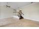 Bright living room with access to a staircase, fireplace, and front entrance at 6766 Edgeworth Dr, Orlando, FL 32819