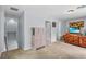 Bonus room with carpeted floors and decorative furniture perfect for relaxing or entertaining guests at 701 Little Hampton Ln, Gotha, FL 34734