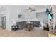 Comfortable living room with sectional sofa and staircase at 701 Little Hampton Ln, Gotha, FL 34734