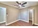 This is a cozy bedroom with hard wood floors and walk in closet at 7504 Willow Wisp E Dr, Lakeland, FL 33810