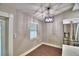 Bright dining area featuring modern lighting and stainless steel appliances at 7504 Willow Wisp E Dr, Lakeland, FL 33810
