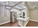 Modern kitchen featuring stainless steel appliances and quartz countertops at 7504 Willow Wisp E Dr, Lakeland, FL 33810