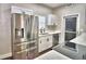 Contemporary kitchen featuring stainless steel appliances and white cabinets at 7504 Willow Wisp E Dr, Lakeland, FL 33810