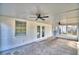 Covered lanai with white walls and ceiling, featuring ceiling fans and lots of natural light at 7504 Willow Wisp E Dr, Lakeland, FL 33810