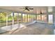 Enclosed lanai with lots of windows for natural light and exterior views at 7504 Willow Wisp E Dr, Lakeland, FL 33810