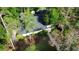 Aerial view of a home featuring a well-maintained roof, yard with trees, and patio area at 955 Gamewell Ave, Maitland, FL 32751