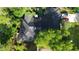 Aerial view of a home showcasing the roof, backyard, and driveway with parking at 955 Gamewell Ave, Maitland, FL 32751