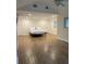 Large, open bedroom featuring ceramic tile floors and a ceiling fan, providing ample space and comfort at 955 Gamewell Ave, Maitland, FL 32751