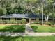 Charming single-story home featuring a stone facade and manicured landscaping for an inviting curb appeal at 955 Gamewell Ave, Maitland, FL 32751