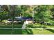 Charming single-story home with lush landscaping and a welcoming entrance at 955 Gamewell Ave, Maitland, FL 32751