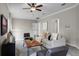 Spacious upstairs living area with comfortable seating and a view of the home's interior at 9670 Cypress Pine St, Orlando, FL 32827