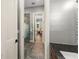 Bathroom featuring modern fixtures, tiled floors, and glass door shower adjacent to primary bedroom at 9743 Chestnut Ridge Dr, Windermere, FL 34786