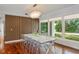 Dining area showcasing modern decor, ample natural light, and seamless integration with the outdoor environment at 9743 Chestnut Ridge Dr, Windermere, FL 34786