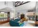 Spacious open-concept floor plan featuring a bar, living room, and dining area at 9743 Chestnut Ridge Dr, Windermere, FL 34786
