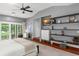 Spacious main bedroom with sliding glass doors leading to the backyard, modern furniture and ceiling fan at 9743 Chestnut Ridge Dr, Windermere, FL 34786
