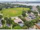 Aerial view of the home's location in a neighborhood near a lake and downtown area at 10080 Cove Lake Dr, Orlando, FL 32836