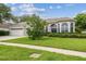 Charming single-story home featuring a well-manicured lawn and inviting curb appeal at 10080 Cove Lake Dr, Orlando, FL 32836