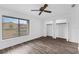 Bright bedroom with natural light, spacious closet, and a modern ceiling fan at 101 Grand Plaza Dr # A40, Orange City, FL 32763
