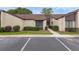 Charming condo featuring a well-manicured lawn, beautiful bushes, and parking spaces ready for you at 101 Grand Plaza Dr # A40, Orange City, FL 32763