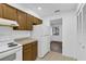 Efficient kitchen with essential appliances and convenient access to the dining area at 101 Grand Plaza Dr # A40, Orange City, FL 32763