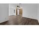 This welcoming living room features hard wood floors and fresh paint at 101 Grand Plaza Dr # A40, Orange City, FL 32763