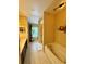 Bright bathroom features double sinks, walk-in shower, soaking tub, and window views at 10350 Lake District Ln # S, Orlando, FL 32832