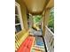 Inviting porch featuring comfortable seating and a relaxing outdoor space for enjoying the view at 10350 Lake District Ln # S, Orlando, FL 32832