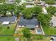 Aerial shot of the house showing backyard, storage shed, and screened-in porch at 1046 Seminole Creek Dr, Oviedo, FL 32765