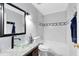Modern bathroom with stylish vessel sink, sleek fixtures, and tub shower at 1046 Seminole Creek Dr, Oviedo, FL 32765