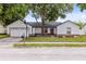 Charming single-story home with attached two-car garage and well-maintained landscaping at 1046 Seminole Creek Dr, Oviedo, FL 32765