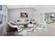 Bright living room features vaulted ceiling, a modern rug, and comfortable seating at 1046 Seminole Creek Dr, Oviedo, FL 32765