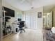 Office space with tile floors, ample lighting, a closet, and comfortable seating, ready for productivity at 10460 Riva Ridge Trl, Orlando, FL 32817