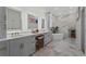 Bright bathroom showcasing a double vanity, soaking tub, and marble accents at 1141 Waldorf Ct, Winter Springs, FL 32708
