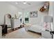 Bright ' bedroom with a full-length mirror and plush rug at 1141 Waldorf Ct, Winter Springs, FL 32708