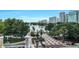 Enjoy beautiful city view from the balcony with lush trees, lake and walkway at 151 E Washington St # 5B, Orlando, FL 32801