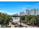 Enjoy beautiful city view from the balcony with lush trees, lake and walkway at 151 E Washington St # 5B, Orlando, FL 32801