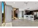 Stylish kitchen featuring an island with seating and stainless steel appliances at 151 E Washington St # 5B, Orlando, FL 32801
