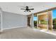 Bright room features a large window with views of the surrounding city and access to a private balcony at 151 E Washington St # 5B, Orlando, FL 32801