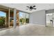 Bright room features a large window with views of the surrounding city and access to a private balcony at 151 E Washington St # 5B, Orlando, FL 32801