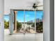 Bright living room with expansive windows offering stunning views of Lake Eola at 151 E Washington St # 5B, Orlando, FL 32801