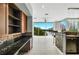 Open-concept living area offers water views, modern lighting and breakfast bar to the kitchen area at 151 E Washington St # 5B, Orlando, FL 32801