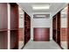 A walk-in closet with custom shelving and drawers at 151 E Washington St # 5B, Orlando, FL 32801