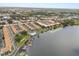 Charming townhome community with a community pool and dock access on a picturesque lake, and easy access to city amenities at 151 N Orlando Ave # 212, Winter Park, FL 32789