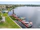 Lakefront community featuring a boat dock, pool, and easy lake access at 151 N Orlando Ave # 212, Winter Park, FL 32789