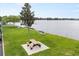 Community space including picnic tables for outdoor enjoyment and relaxation at 151 N Orlando Ave # 212, Winter Park, FL 32789